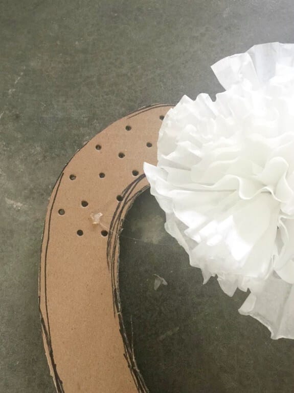 How to make an easy coffee filter wreath with upcycled items from your home.
