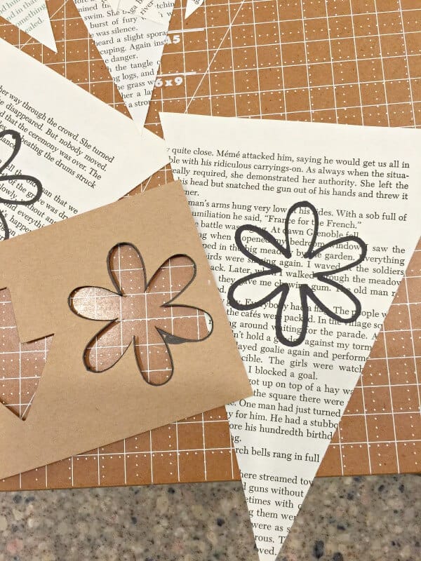 Make this spring banner with book pages! Such a great idea! | Twelveonmain.com