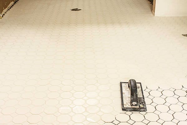 Grout tile like a pro! Don't let tile intimidate you, it is easier than you think! | Twelveonmain.com