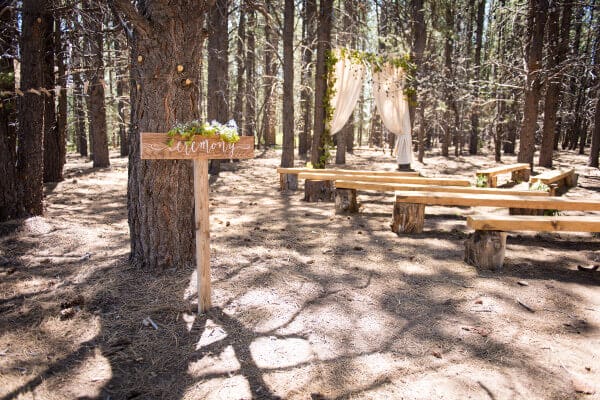 These handmade signs were made for all the different spaces for a beautiful outdoor woodland themed wedding.