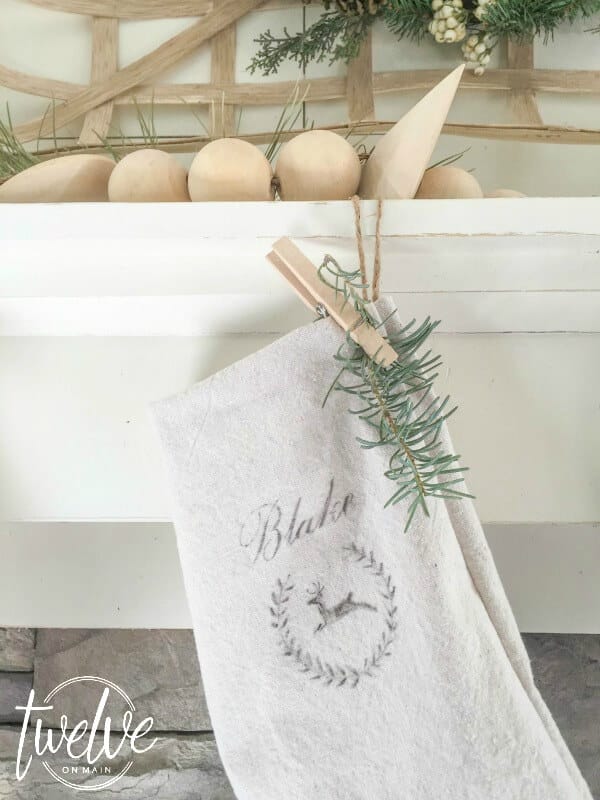 These farmhouse style Christmas stockings made from drop cloths are so amazing and so easy!