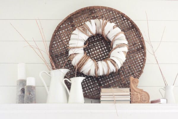 The neutral look and lush texture of this DIY farmhouse wreath is perfect.