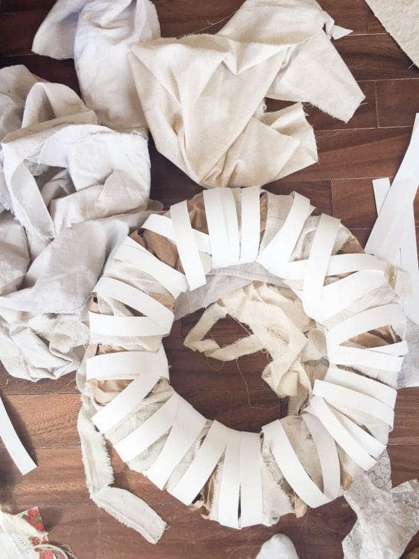 Use standard white poster board to create an awesome DIy farmhouse wreath