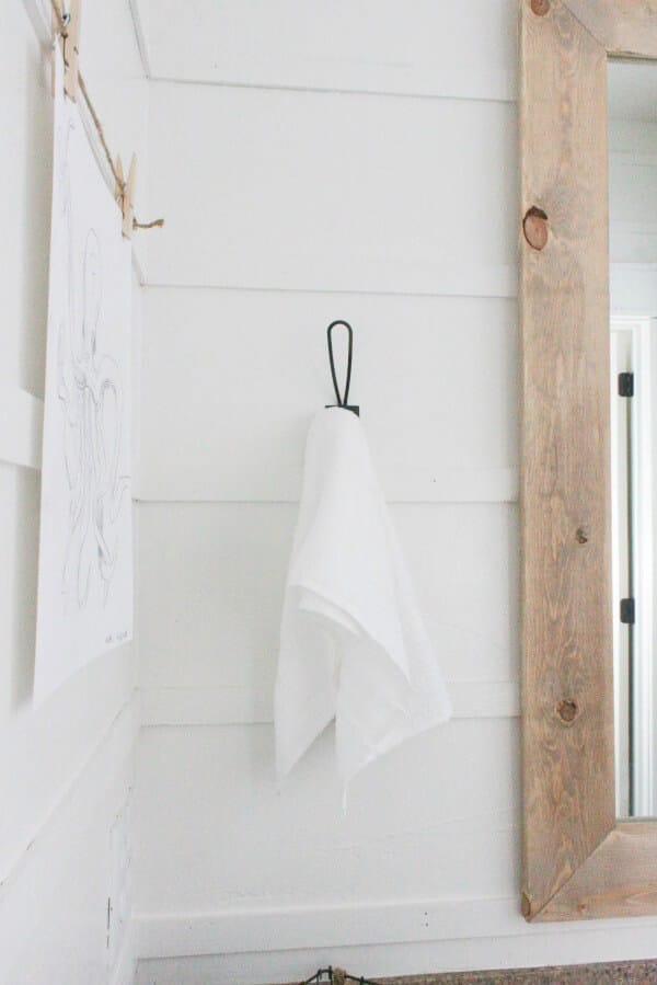 Try this alternative to shiplap! Easy and inexpensive DIY reverse shiplap is the best new thing!