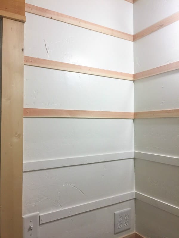Applying this DIY reverse shiplap wall treatment is so easy and inexpensive!