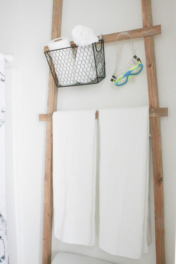 Make this over the toilet towel storage ladder! Its easy and so stylish and you can make it in under an hour!