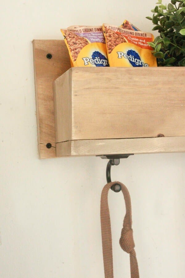 If you are a dog lover, you will love this DIY dog leash and treat holder! It is so easy to make and is functional and stylish!