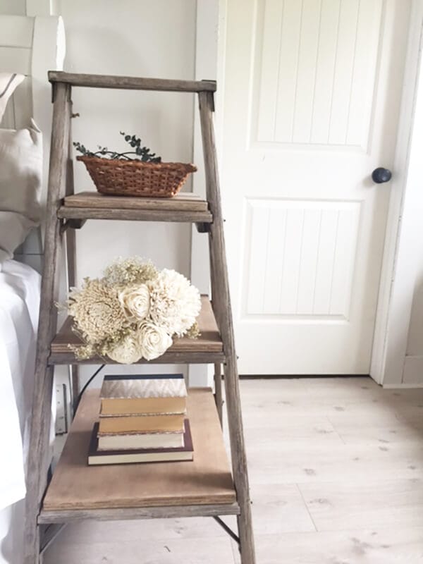 Rustic farmhouse nightstand made from an old salvaged ladder.