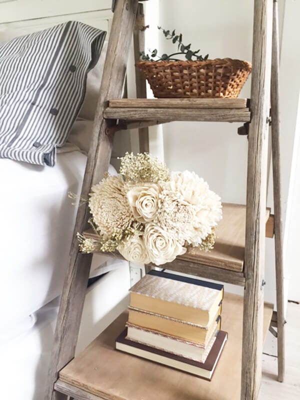 Make a farmhouse nightstand from an old salvaged ladder with these simple steps!