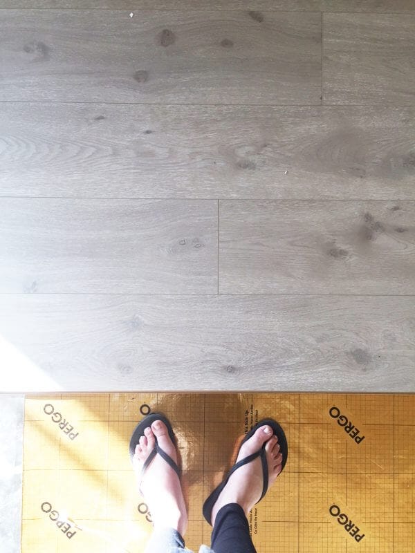 Install Pergo laminate flooring for a farmhouse look | Pergo Modern Oak laminate flooring | laminate flooring | farmhouse style | rustic flooring | modern farmhouse style | master bedroom decor | farmhouse master bedroom
