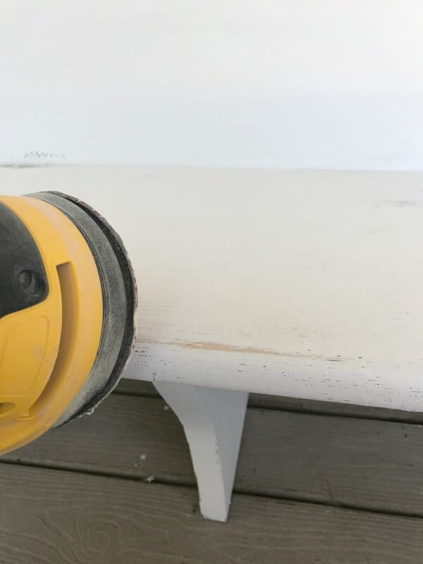 Distressed furniture using an orbital sander is so easy! It takes less than 5 minutes to distress a piece of furniture! Check out these furniture distressing tips!