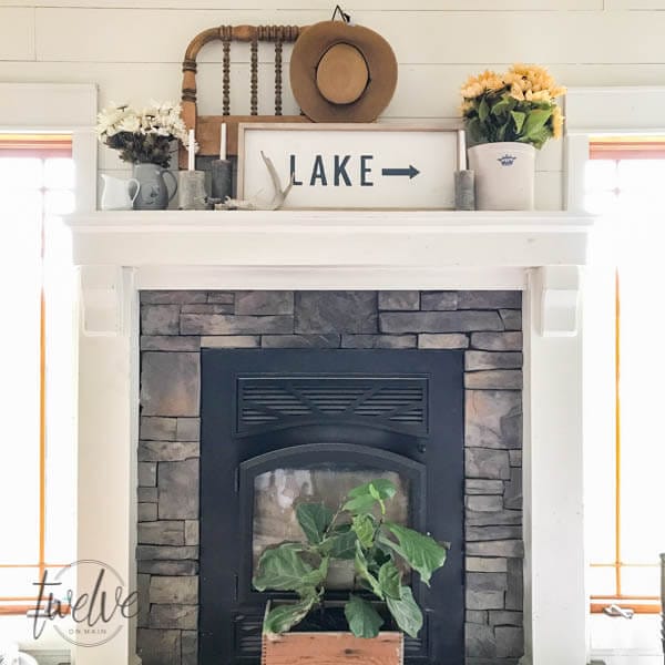 You have to see how they tansformed this fireplace into a farmhouse style stacked stone fireplace. Love the shiplap accents and the handmade corbels!