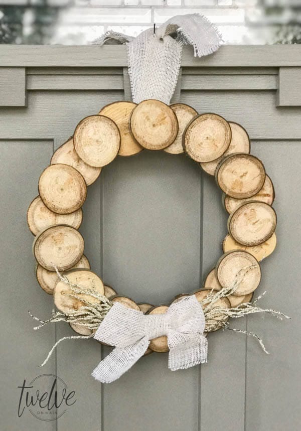 A wreath made with wood slices?  Yes please!