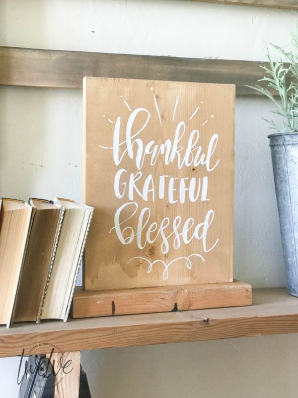 Thankful, grateful, blessed. This farmhouse style reversible wood sign was so easy to make and its the perfect rustic piece for your home.