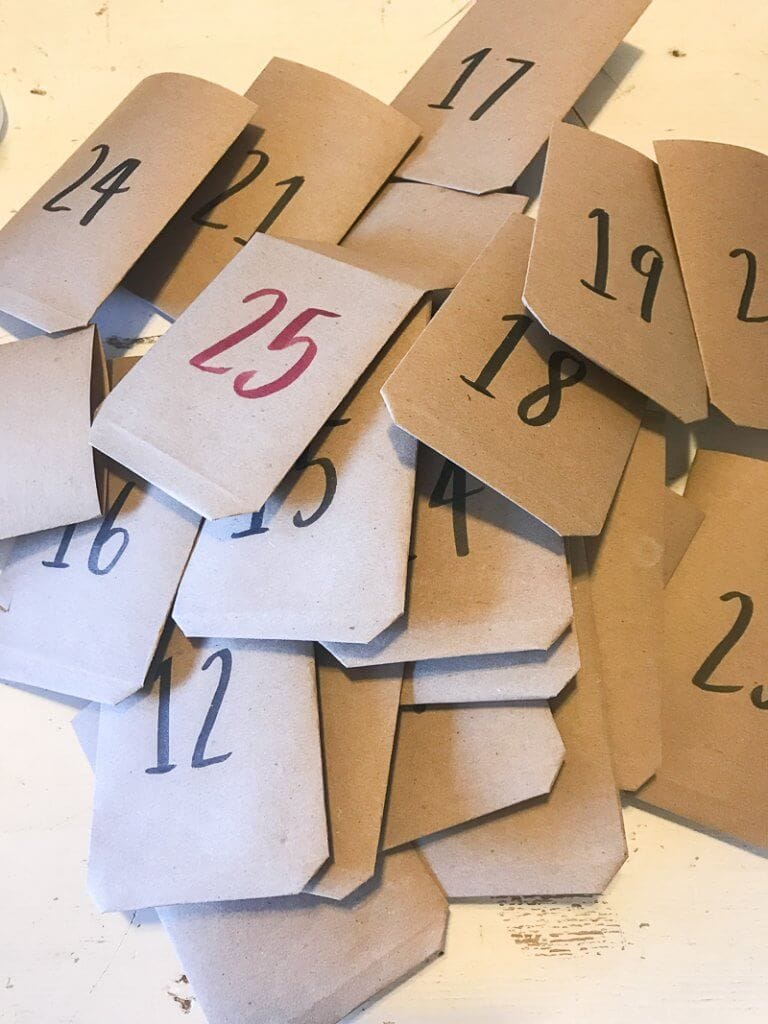 Handmade paper envelopes for a simple Christmas advent calendar.