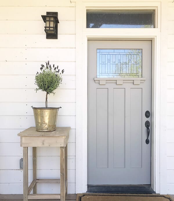 Love how this outdoor side table looks with this front door. Its a beautiful combination. Make on for yourself here!