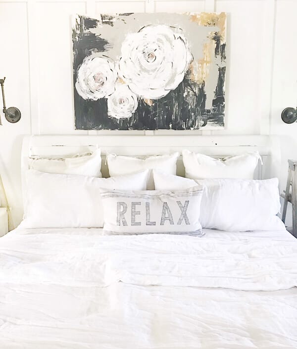 Farmhouse artwork in the bedroom. Beautiful abstract floral painting!
