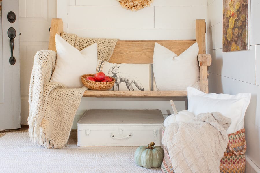 Unexpected pops of color in the farmhouse style fall decor. Make your entryway shine!
