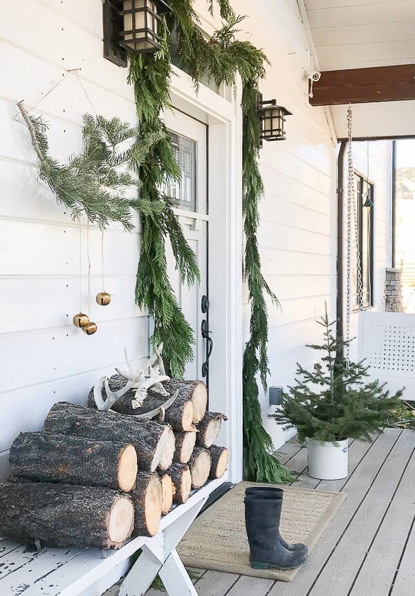 A touch or Nordic or Scandinavian Christmas decor on the porch