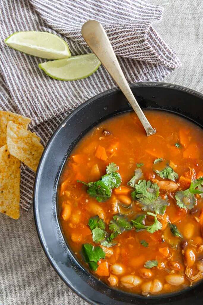 Make the easiest and tastiest chicken tortilla soup recipe ever! With instructions for the stovetop, crockpot and the InstaPot, this recipe works for your schedule.