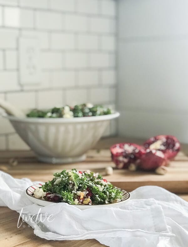 Make this unique kale, wild rice, feta cheese, and wild rice pomegranate salad today!