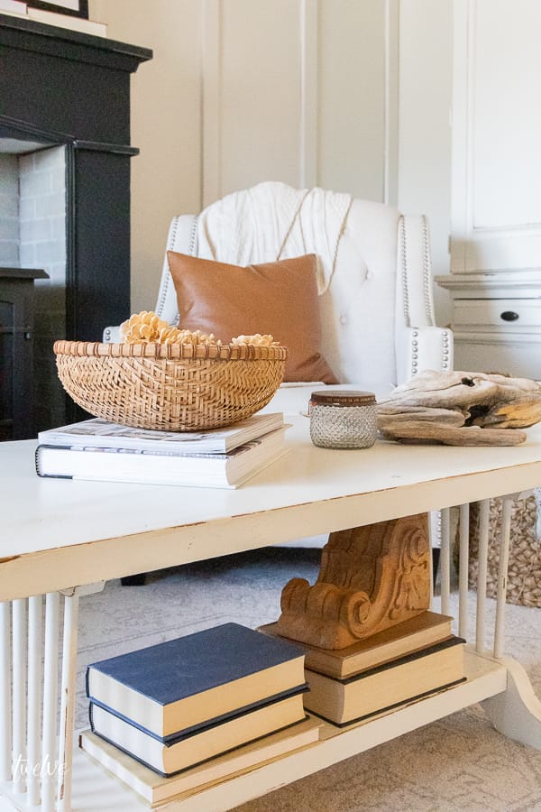 Beautifully styled coffee table in this modern farmhouse bedroom. Try these tips to learn how to style a coffee table like a pro!