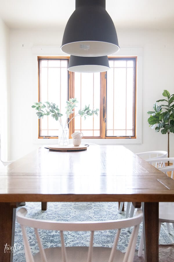 Wood windows are a huge feature in this modern farmhouse dining room!
