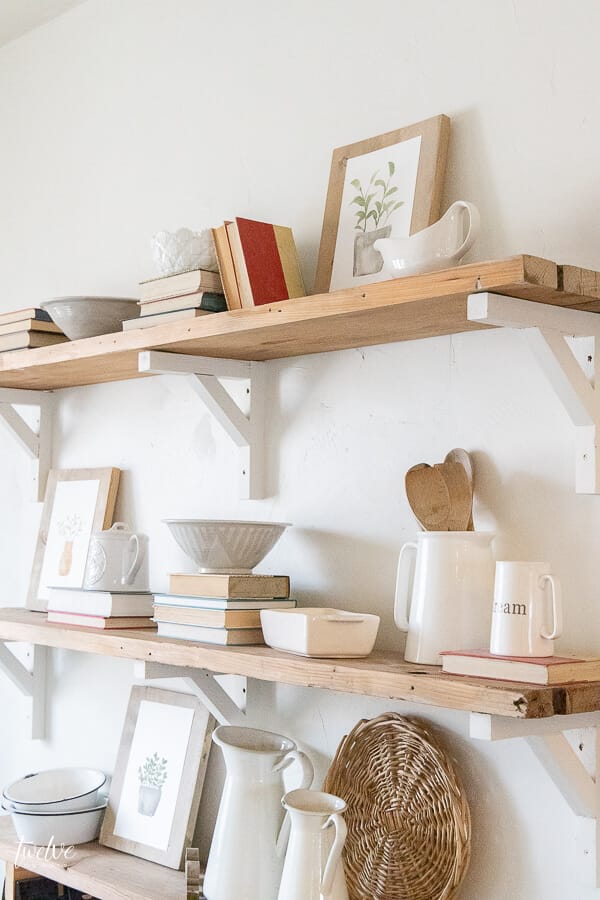 These watercolor plant printables add the perfect touch of spring to these rustic reclaimed wood shelves. So perfectly farmhousey