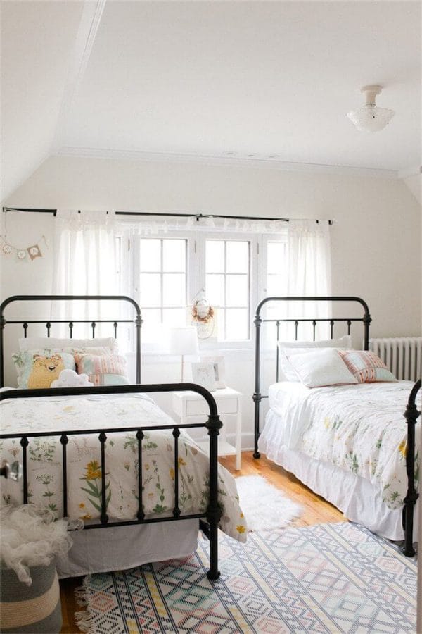 Girls bedroom with metal beds!  So cute!