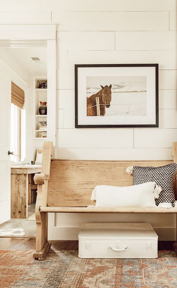 Gorgeous horse photography in this modern farmhouse entryway