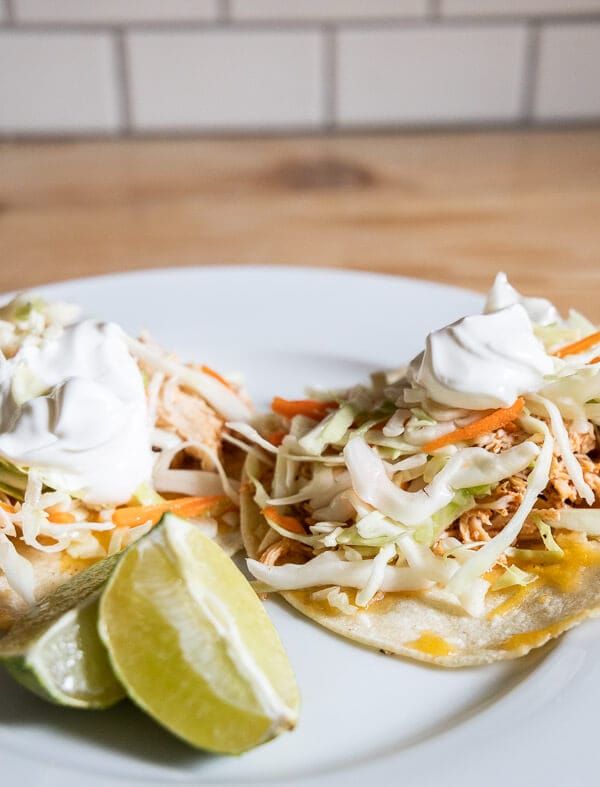 Have an Instapot? Make these deliciously easy chicken tacos with zesty slaw. You probably already have everything in your kitchen for them already!