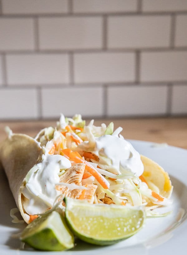 Have an Instapot? Make these deliciously easy chicken tacos with zesty slaw. You probably already have everything in your kitchen for them already!