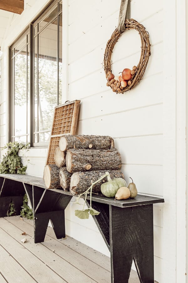 This hand built primitive style black bench is the focal point of my fall porch decor. It goes perfectly with my handmade apple and walnut wreaths!