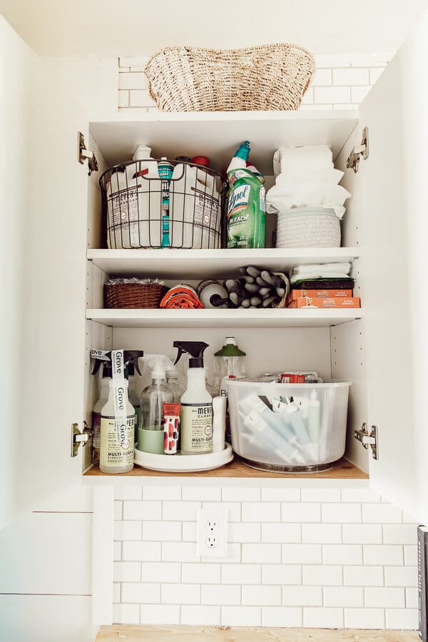 How to clean and organize a cleaning cabinet like a boss. Add all natural safe cleaners to your routine as well! I have all the details and tips!