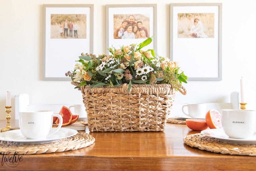 Basket full of spring flowers is the perfect spring table centerpiece! Love using fresh flower arrangements in my home!