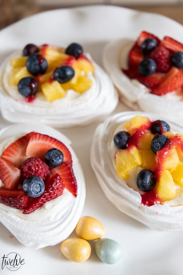 Simple and easy mini pavlova recipe! These are so easy to make and taste amazing! make them for your next get together or as a special weeknight treat!! I promise you can make them!