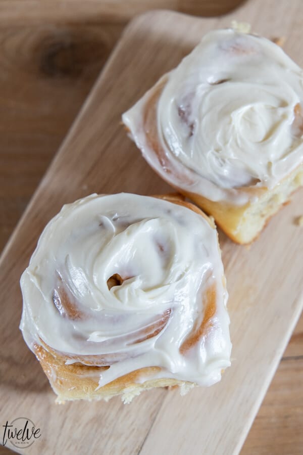 How to make the most delicious light and fluffy cinnamon rolls. These are amazing, soft, and topped with the most amazing tangy cream cheese frosting.