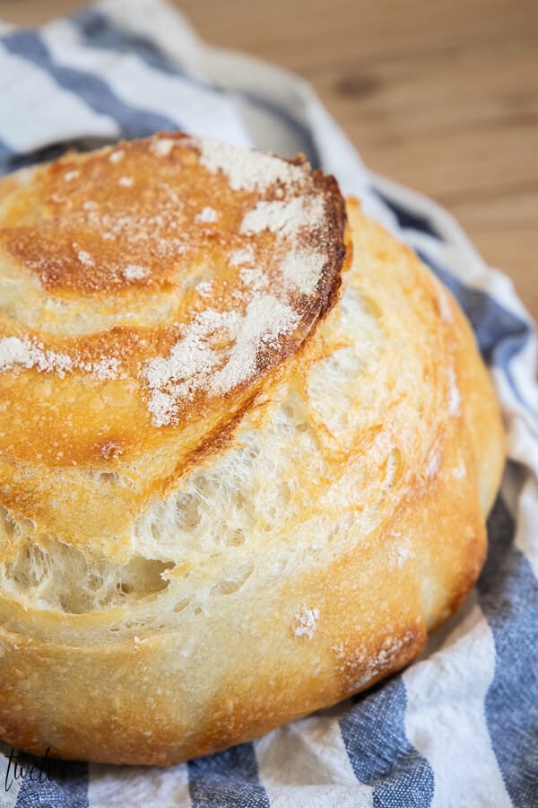 How to make an amazing dutch oven sourdough breador sourdough boule! This has step by step instructions that make it really easy to plan your time and you will realize how easy it is to make!