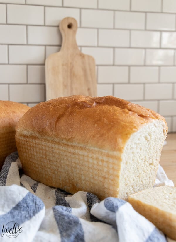 Yummy sourdough sandwich bread! This sourdough bread is so easy to make, delicious, and takes less time than traditional sourdough bread recipes. This sourdough bread makes the most amazing grilled cheese or grilled panini sandwiches, amazing toast or french toast, and of course, sandwiches! The flavor is amazing, you will want to eat the entire loaf, and it takes less than 2 hours!