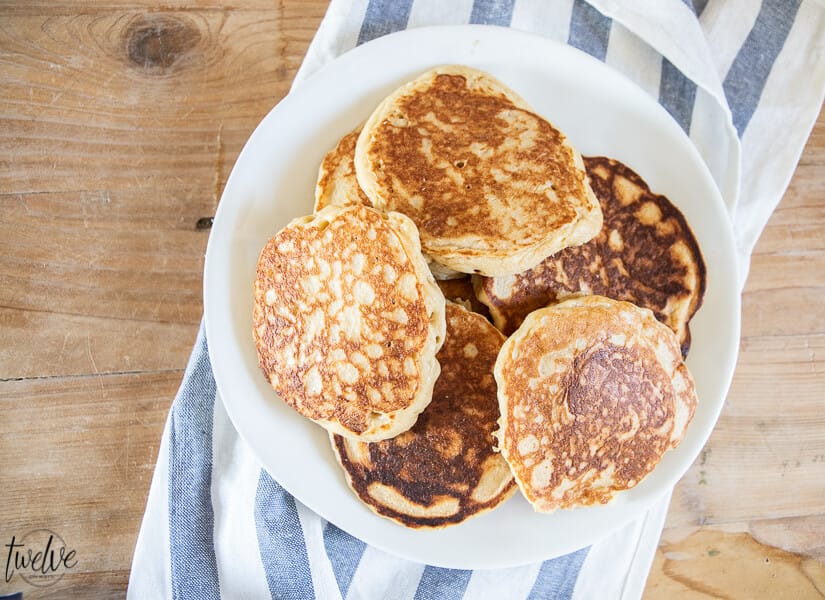 How to make amazing light and fluffy whole wheat pancakes using your blender! These pancakes are so flavorful and have a sweet nutty flavor and just plain amazing!
