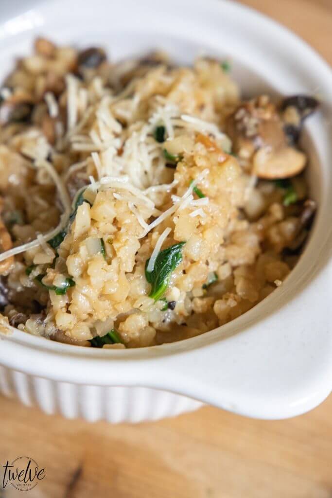 Make the most amazing cauliflower rice recipe! This cauliflower rice risotto is easy to make, packed with flavor and is so good for you!