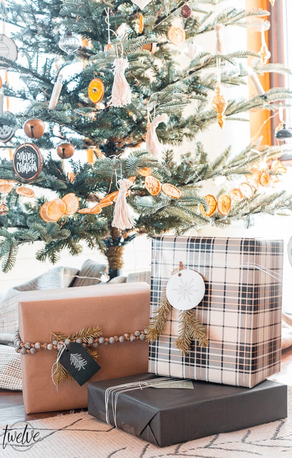 Holiday gift wrapping ideas using craft paper, combining patterns, using unusual items as accents, and FREE printable gift tags!