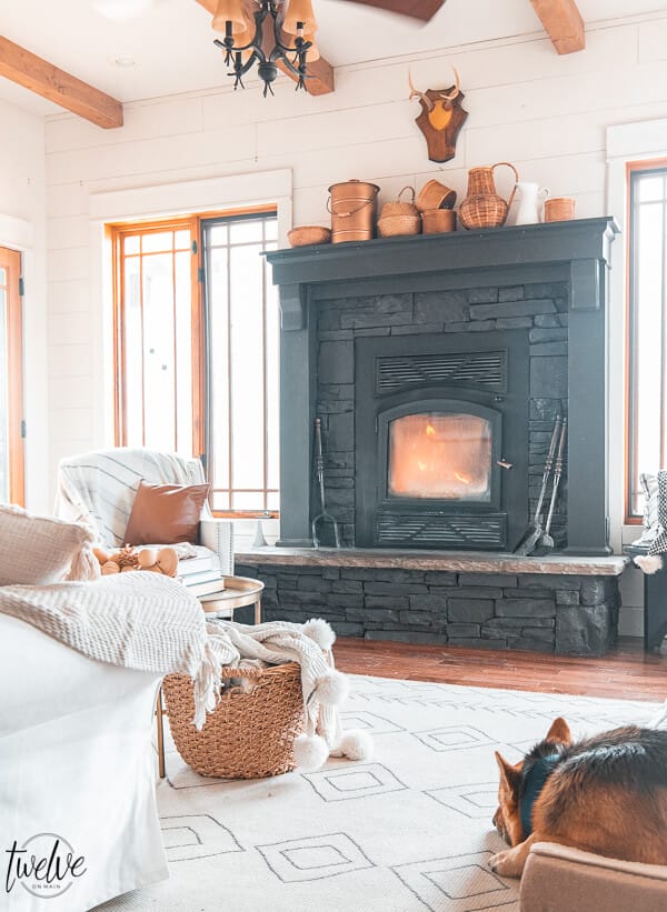 A collection of wooden and copper containers on the mantel inspired my winter decor.