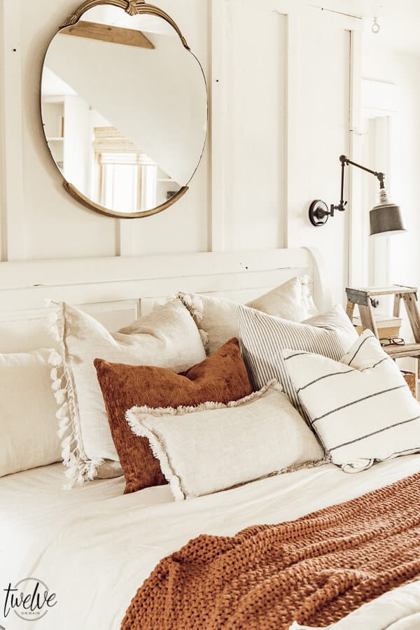 Cozy winter decor in the bedroom. Its easy to add accent colors and textures to give your space and warm and cozy feel that is perfect for winter.
