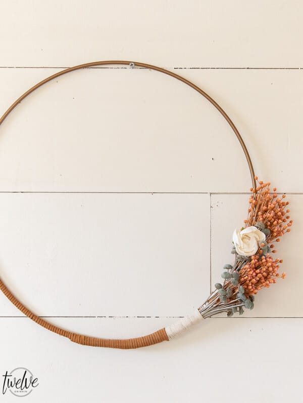 How to make a gorgeous boho style hoop wreath for spring. This is easy to make, affordable and you can customize to your style!