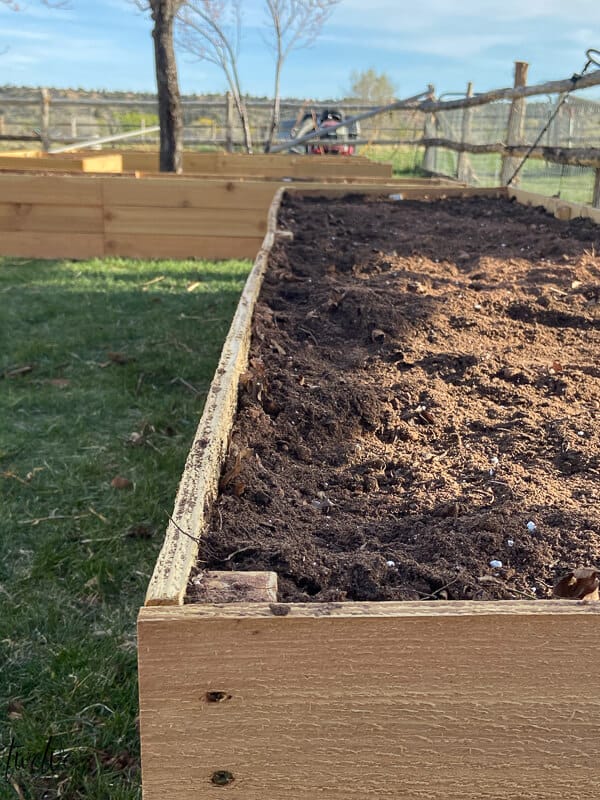 How to make your own affordable rot resistant cedar raised planter boxes to us in your garden, on your patio or other small space.