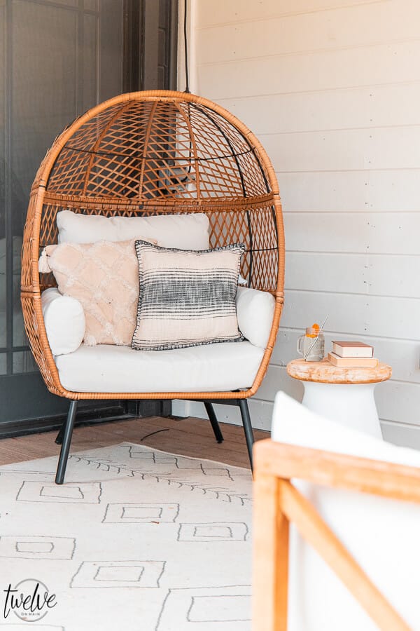 Get this gorgeous egg chair from Walmart as well as the pillows and the rug! Affordable and stylish outdoor furniture ideas, tips and more! I am sharing great backyard patio ideas on the blog and sharing my source for amazing products for less. I got this egg chair, pillows, rug and more at Walmart!