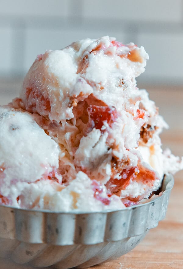 Make this amazing no churn strawberry cheesecake ice cream recipe right now! It is so easy to make and you do not need an ice cream machine.