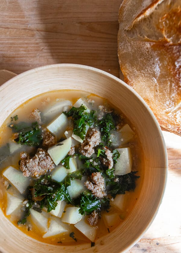 This potato, sausage and kale soup is hearty, flavorful and so easy to make! Its the perfect weeknight meal or rainy day meal!