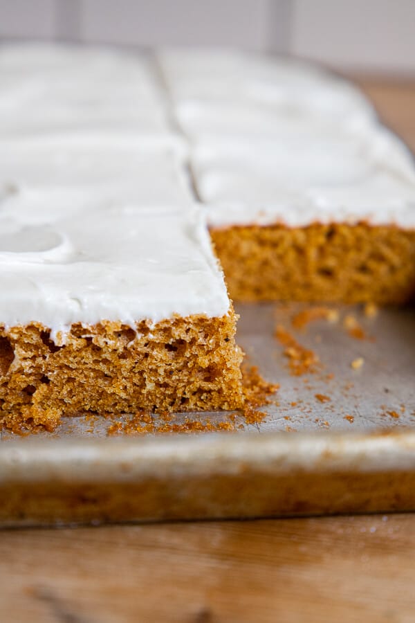 How to make these easy pumpkin bars with cream cheese frosting in under 1 hour! It tastes amazing, it perfect for a big crowd and is the perfect treat for fall.